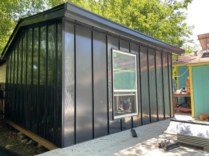 Black standing seam metal wall panels for Metal Roof Installation in Iona