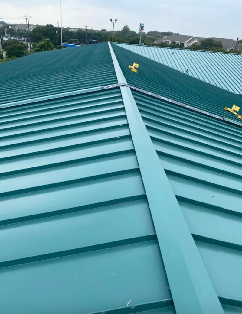 Green commercial metal roof ridge and valley for Metal Roof Repair in Iona
